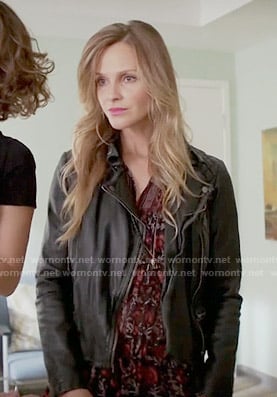 Abby’s red printed dress and leather jacket on Girlfriends Guide to Divorce