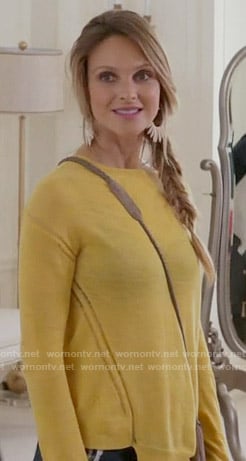 Phoebe's yellow sweater and white spike earrings on Girlfriends Guide to Divorce