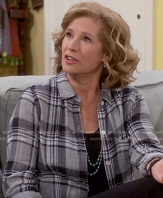 Vanessa's grey plaid shirt on Last Man Standing