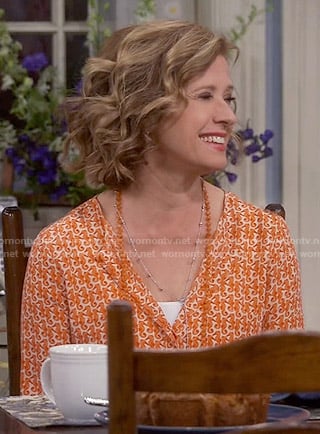 Vanessa's orange seahorse print blouse on Last Man Standing