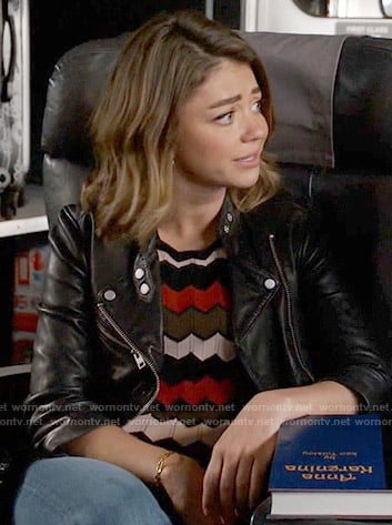 Haley's chevron knit top and leather jacket on Modern Family