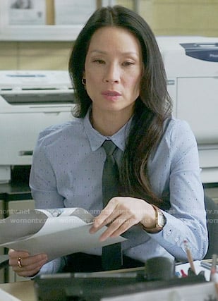 Joan's blue stripe and dot shirt on Elementary