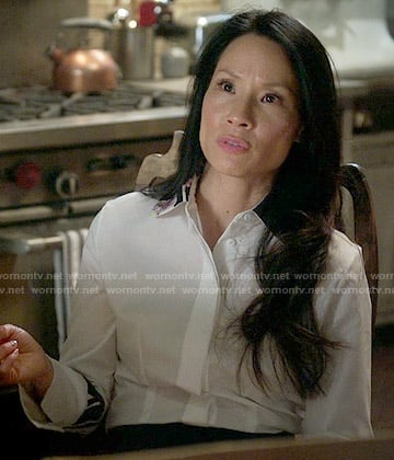 Joan's white shirt with printed collar on Elementary