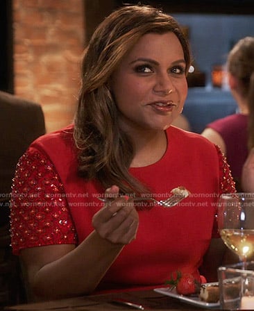 Mindy's red dress with embellished sleeves on The Mindy Project