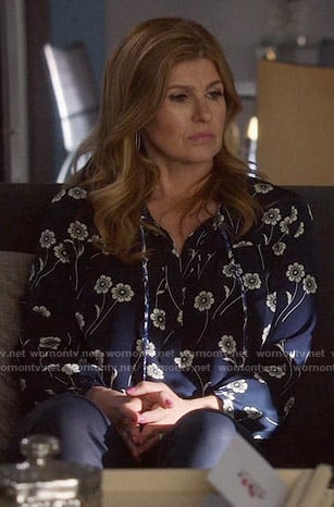 Rayna’s blue flower printed blouse on Nashville