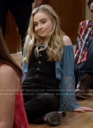 Maya's blue lace off shoulder top and black overalls on Girl Meets World