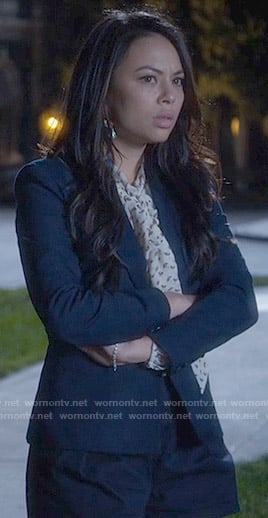 Mona's printed tie neck blouse and navy shorts on Pretty Little Liars