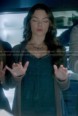 Nora’s teal lace top on The Vampire Diaries