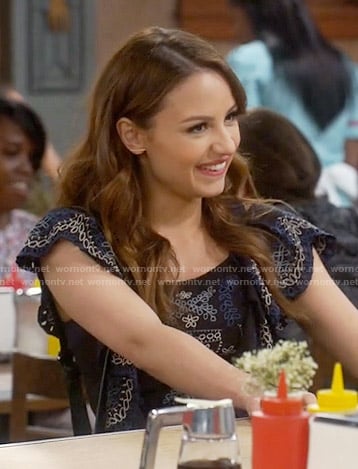 Sofia's black embroidered top on Young and Hungry