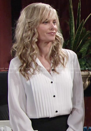 Ashley’s white pleated blouse with black buttons on The Young and the Restless