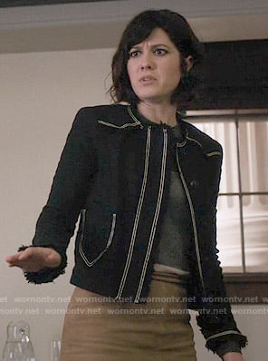 Laurel’s black tweed jacket with white trim on BrainDead