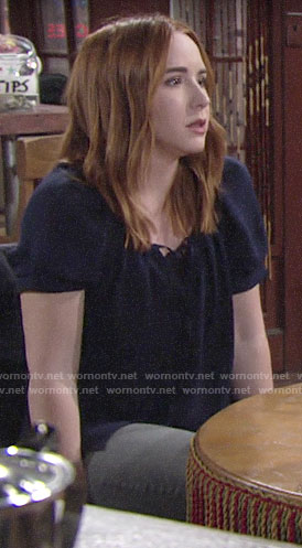 Mariah’s navy short sleeve top on The Young and the Restless