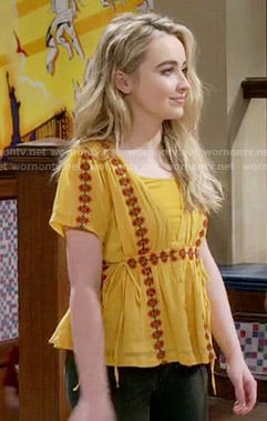 Maya’s yellow top with red embroidery on Girl Meets World