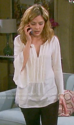 Theresa’s white bell sleeve top on Days of our Lives
