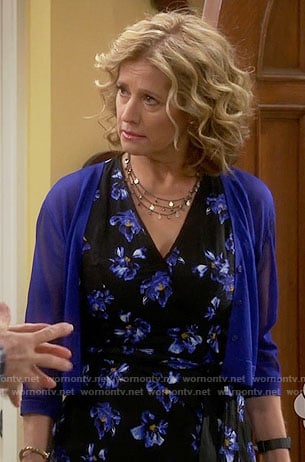 Vanessa's black and blue floral dress on Last Man Standing