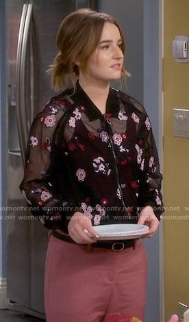 Eve's sheer embroidered bomber jacket and pink pants on Last Man Standing