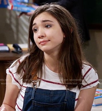 Riley's striped tee and denim overalls with leather straps on Girl Meets World