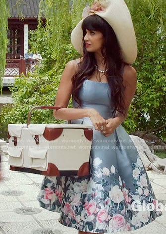 Tahani's grey jacquard rose print dress and picnic basket on The Good Place