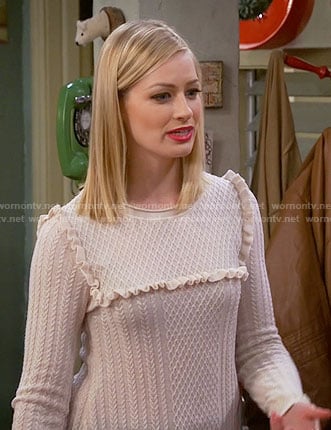 Caroline's ruffled trim sweater on 2 Broke Girls