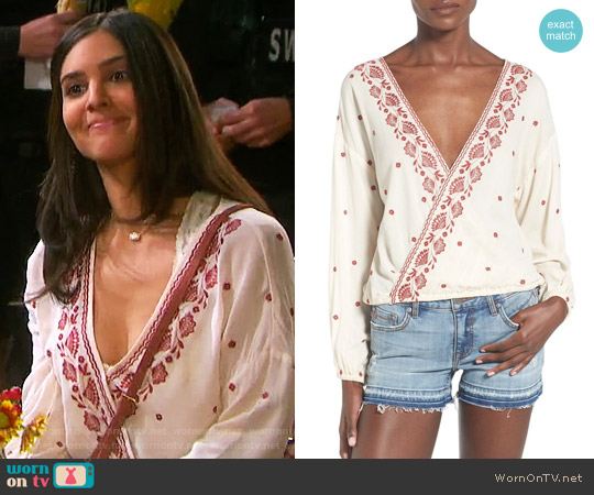 Chloe & Katie Embroidered Surplice Blouse worn by Gabi Hernandez (Camila Banus) on Days of our Lives