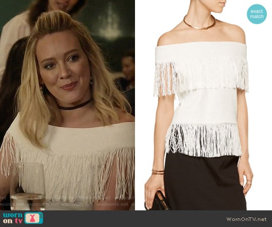 Jonathan Simkhai Fringed off-the-shoulder woven top worn by Kelsey Peters (Hilary Duff) on Younger