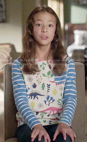 Lily's dinosaur print top with striped sleeves on Modern Family