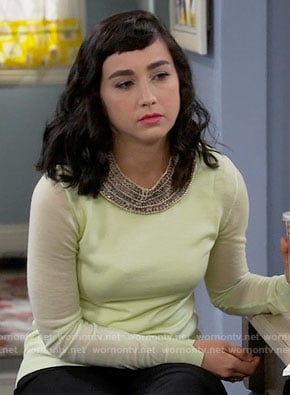 Mandy's lime sweater with cutout back on Last Man Standing