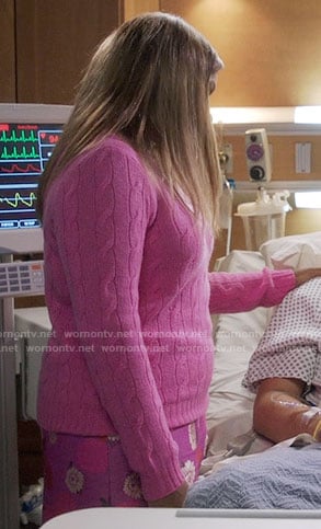 Mindy’s pink cable knit sweater and floral skirt on The Mindy Project