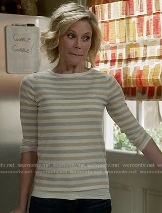 Claire’s grey and beige striped sweater on Modern Family