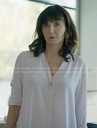 Gail's white v-neck button front blouse on Last Man on Earth