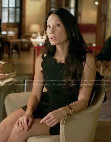 Joan’s black scalloped trim dress on Elementary