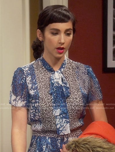 Mandy’s blue printed tie-neck dress on Last Man Standing