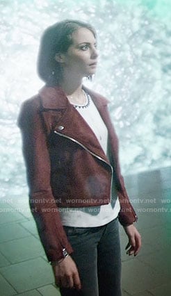 Thea's triangle trim top and red suede moto jacket on Arrow