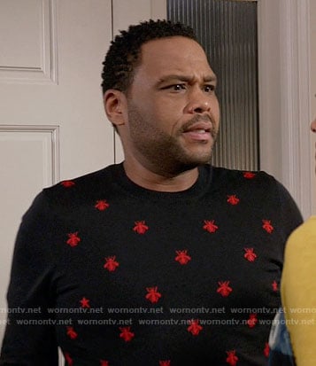 Andre’s navy sweater with red embroidered bees on Black-ish