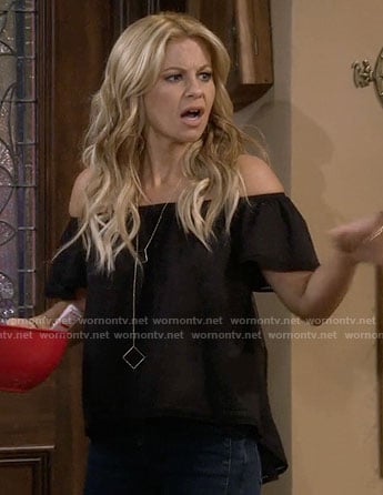 DJ's black off-shoulder top and long square necklace on Fuller House