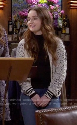 Eve’s white lace bomber jacket on Last Man Standing