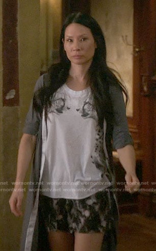 Joan's mirrored cheetah graphic top on Elementary