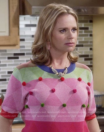 Kimmy's colorblock sweater with pom poms on Fuller House