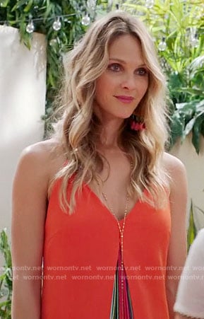 Phoebe’s orange dress with rainbow pleats on Girlfriends Guide to Divorce