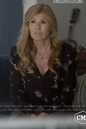 Rayna’s black floral long sleeved blouse on Nashville