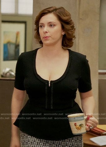 Rebecca’s black zip-front peplum top on Crazy Ex-Girlfriend