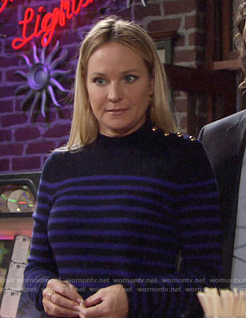 Sharon’s blue striped sweater with gold shoulder buttons on The Young and the Restless