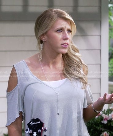 Stephanie's cold shoulder tee and triangle necklace on Fuller House