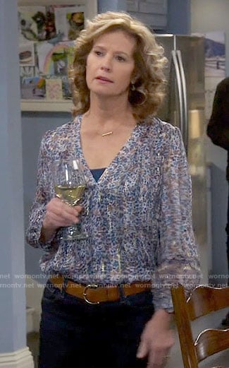 Vanessa's blue printed blouse with metallic stripes on Last Man Standing