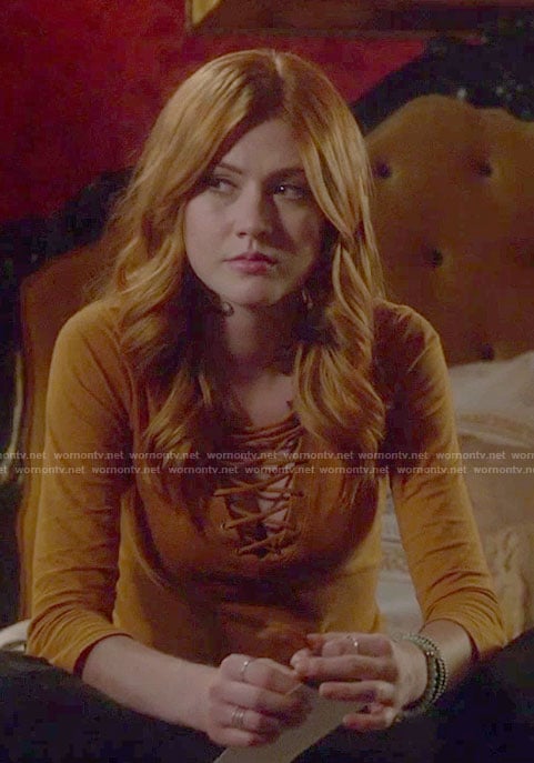 Clary's yellow lace up v-neck top on Shadowhunters