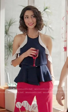 Delia’s navy top with ruffle shoulders on Girlfriends Guide to Divorce