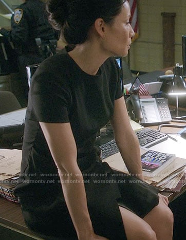 Joan's black short sleeved wrap dress on Elementary