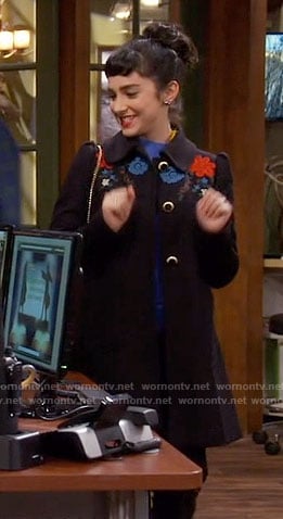 Mandy's black floral embroidered coat on Last Man Standing