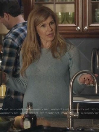 Rayna's  light blue sweater with shoulder buttons on Nashville