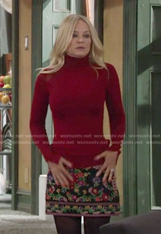 Sharon’s floral embroidered skirt and red turtleneck on The Young and the Restless